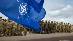 بريطانيا تحث أعضاء الناتو على زيادة نفقاتهم العسكرية