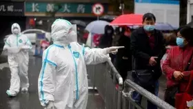 الصين تسجل 148 إصابة جديدة بـ «كورونا»